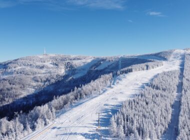 a view of a ski slope from the top of a mountain